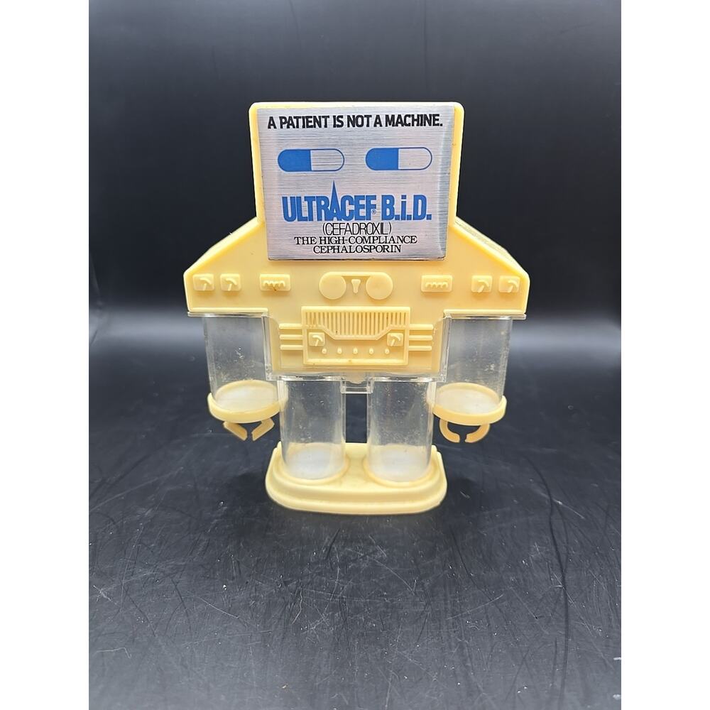 Vintage 1980s Robot Bank White Coin Sorter Piggy Bank Medical Advertisement